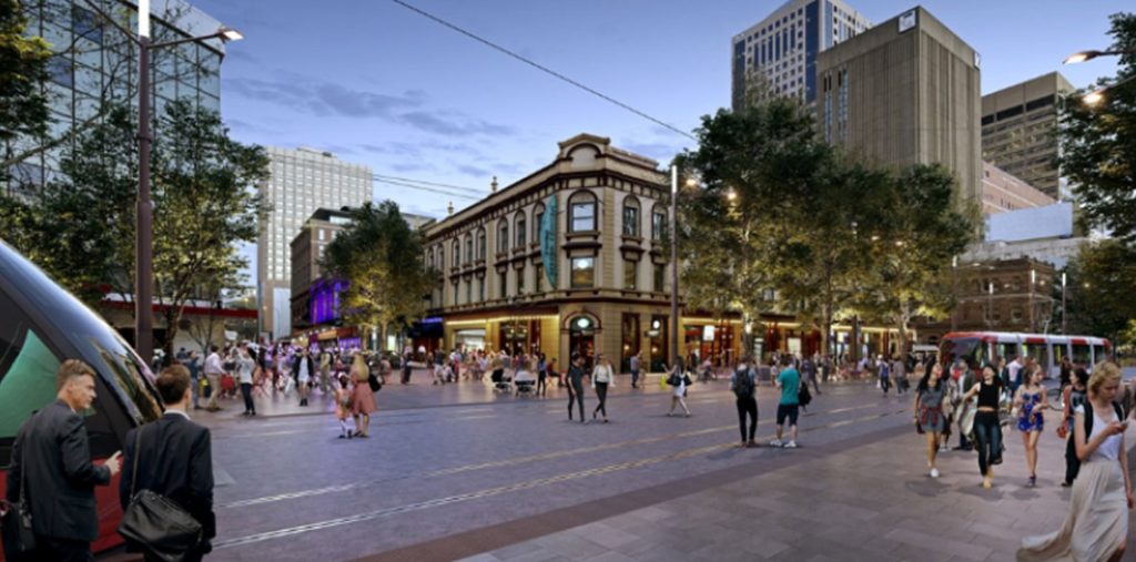 George Street today — a pedestrian boulevard with street trees, seating and light rail